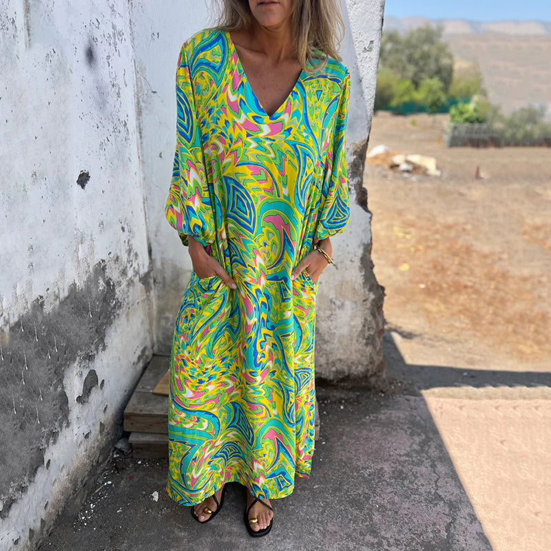 Hailey abstract print boho maxi dress with V-neckline and flowing silhouette