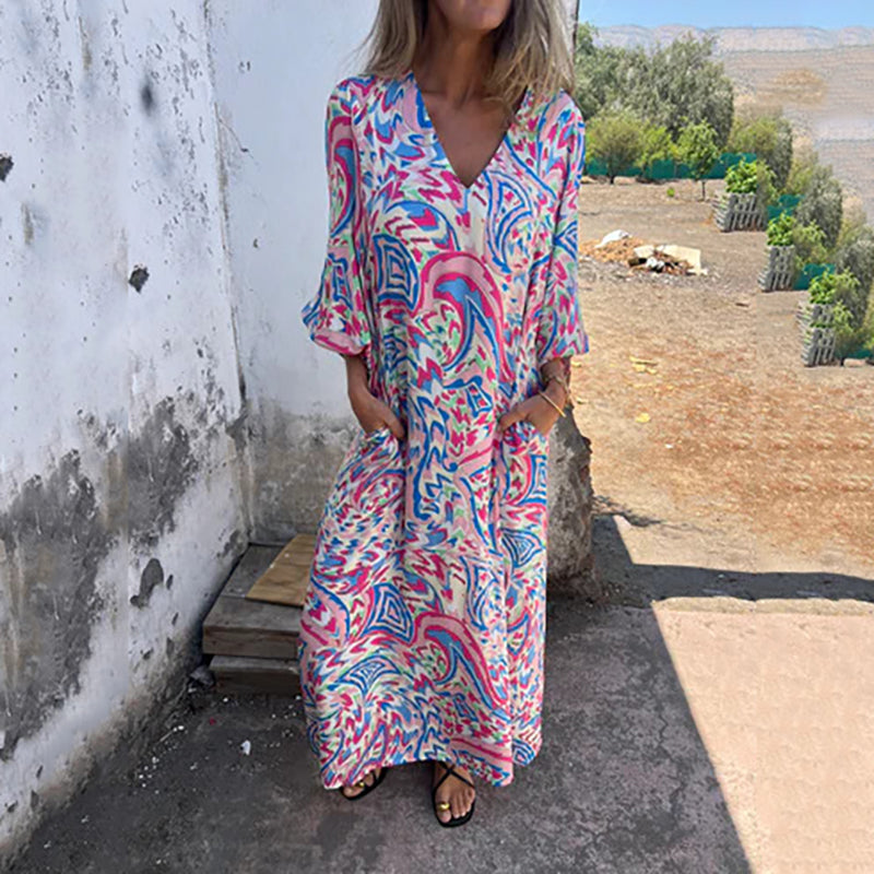 Hailey abstract print boho maxi dress with V-neckline and flowing silhouette