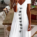 Amala Coastal Bloom floral mini dress with V-neckline and relaxed A-line silhouette