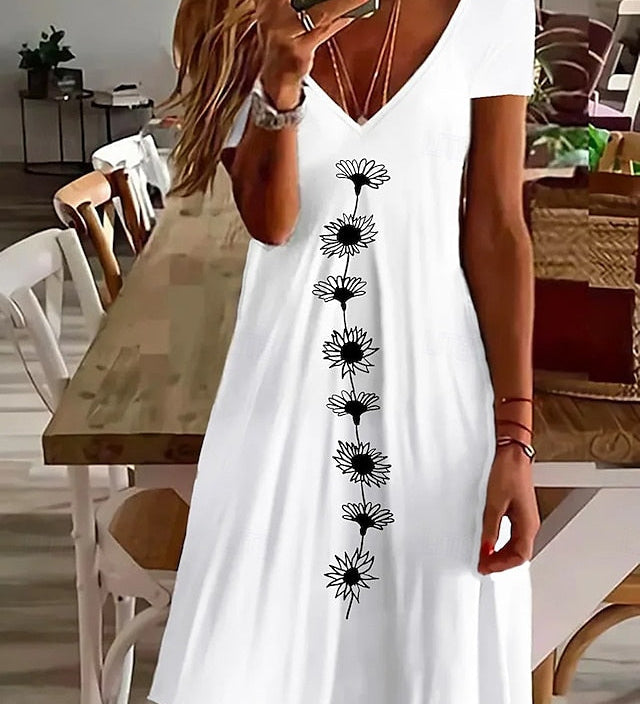 Amala Coastal Bloom floral mini dress with V-neckline and relaxed A-line silhouette