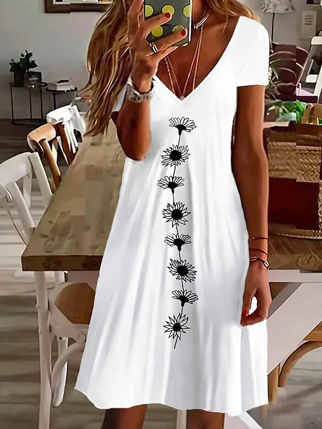 Amala Coastal Bloom floral mini dress with V-neckline and relaxed A-line silhouette