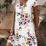 Amala Coastal Bloom floral mini dress with V-neckline and relaxed A-line silhouette