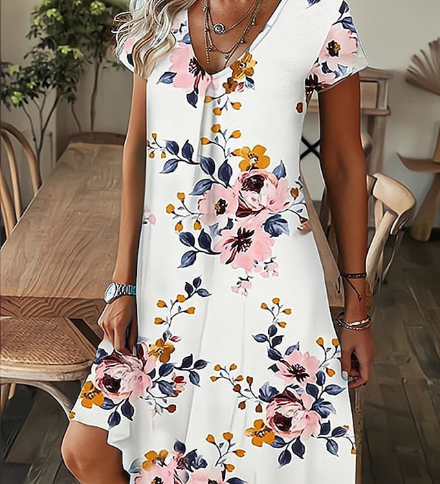 Amala Coastal Bloom floral mini dress with V-neckline and relaxed A-line silhouette