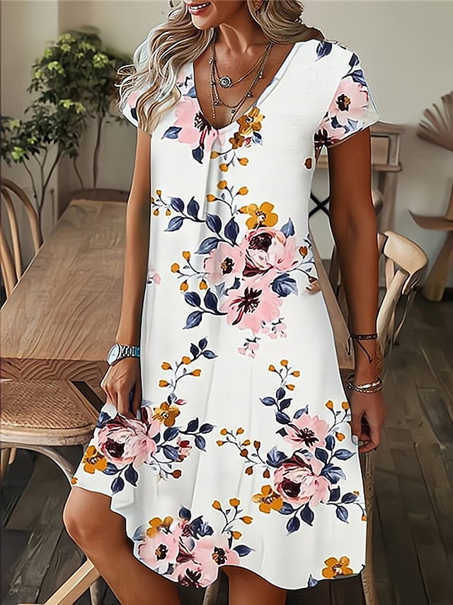 Amala Coastal Bloom floral mini dress with V-neckline and relaxed A-line silhouette
