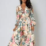 Daliah graceful floral dress with flowing silhouette in green and blue
