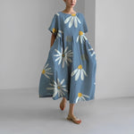 Celia floral Garden Goddess dress in a feminine print, shown in multiple colourways